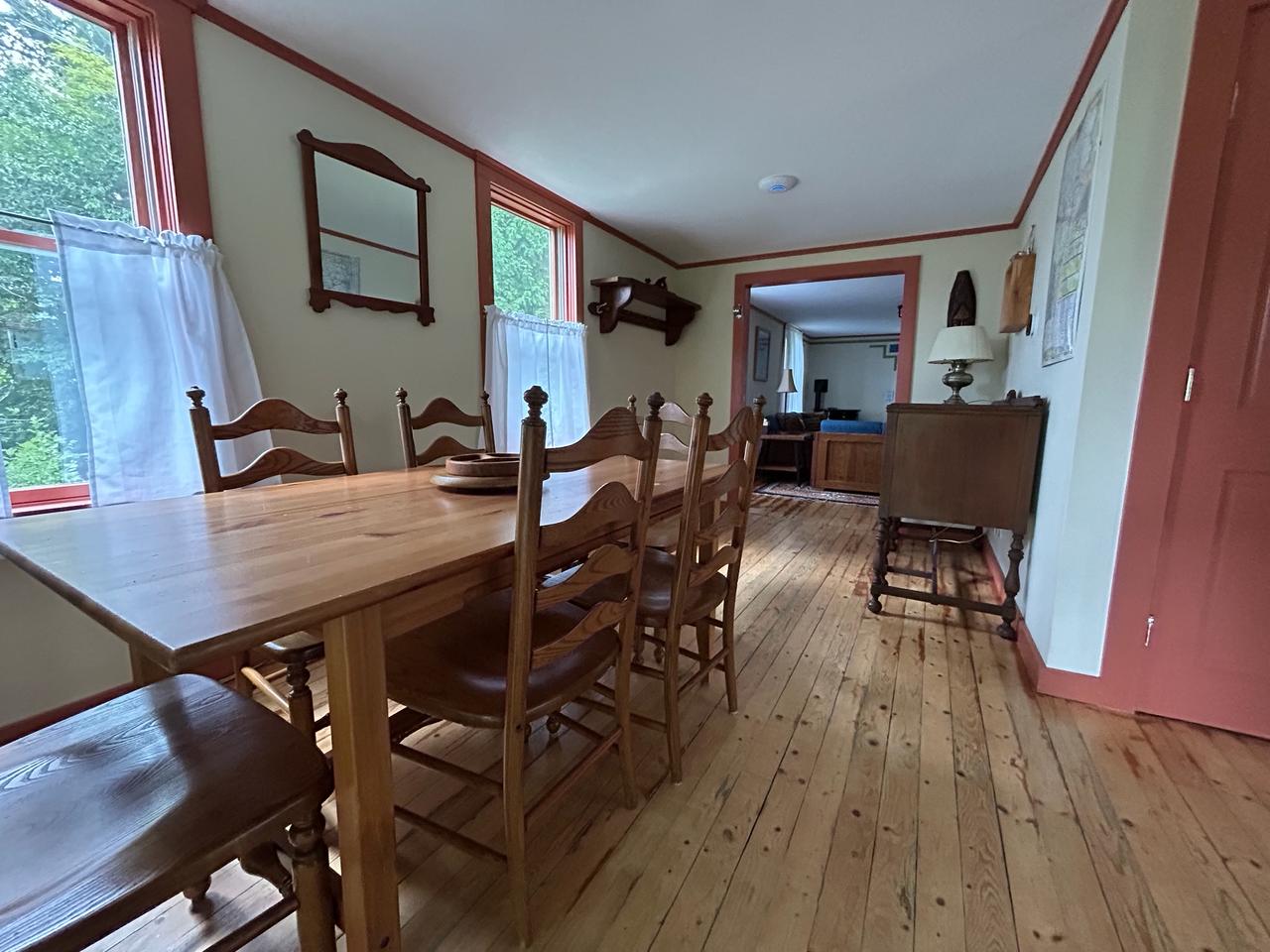 Farmhouse table with ladderback chairs