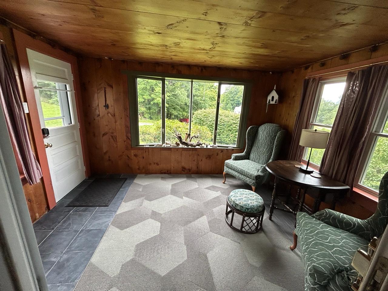 Wood-paneled mudroom entryway
